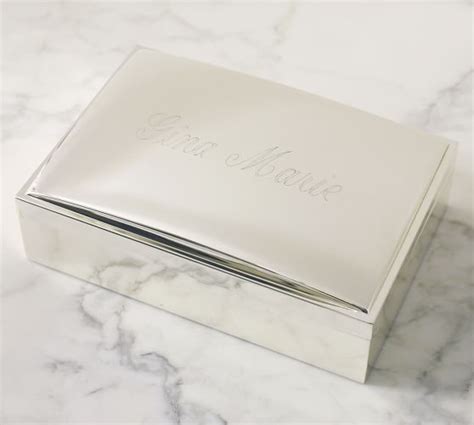 metal box with a s engraved on it|Engravable Silver.